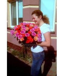 Girl with a bouquet of red roses Bouquet of 51 roses with delivery to Kazatin