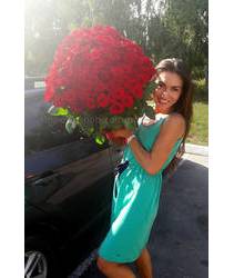 Girl with a bouquet of roses delivered Bouquet of 101 red roses Novomoskovsk