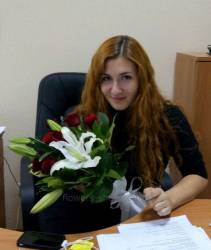 Send flowers to Berdichev Bouquet of roses and lilies for girls from Berdichev