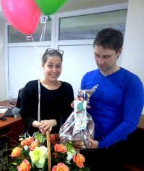 Basket with roses, balloons and fruit for the recipient of the Sum Send flowers and gifts to Sumy