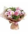 Букет из розовых гербер, хризантем и альстромерий в сетке